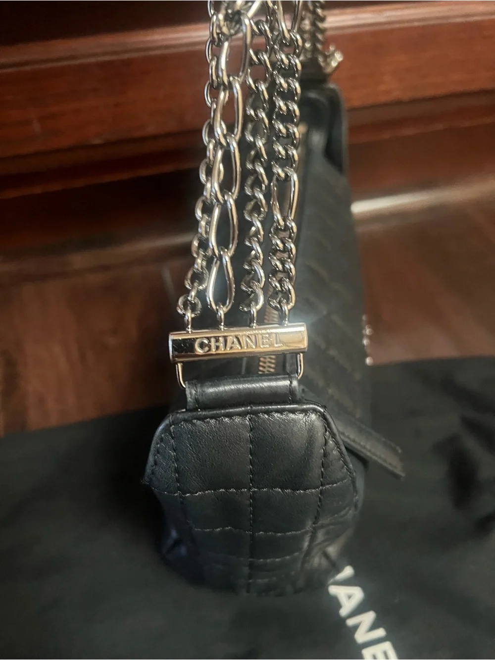 CHANEL Black Quilted Leather Shoulder Bag with Chain Strap and CC Logo